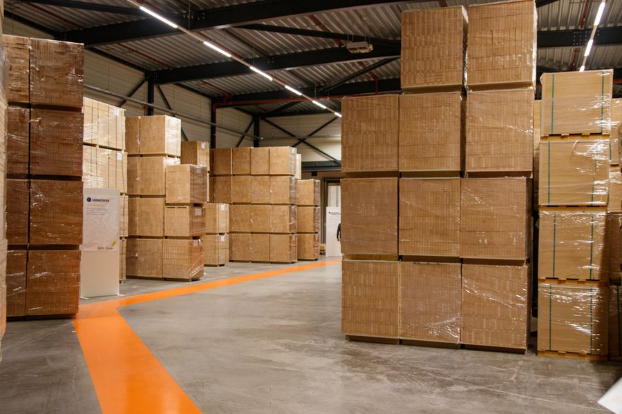 Corrugated cardboard boxes stacked in a packaging warehouse