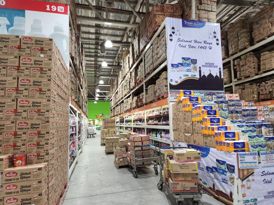 Retail and merchandise cartons arranged on warehouse shelves